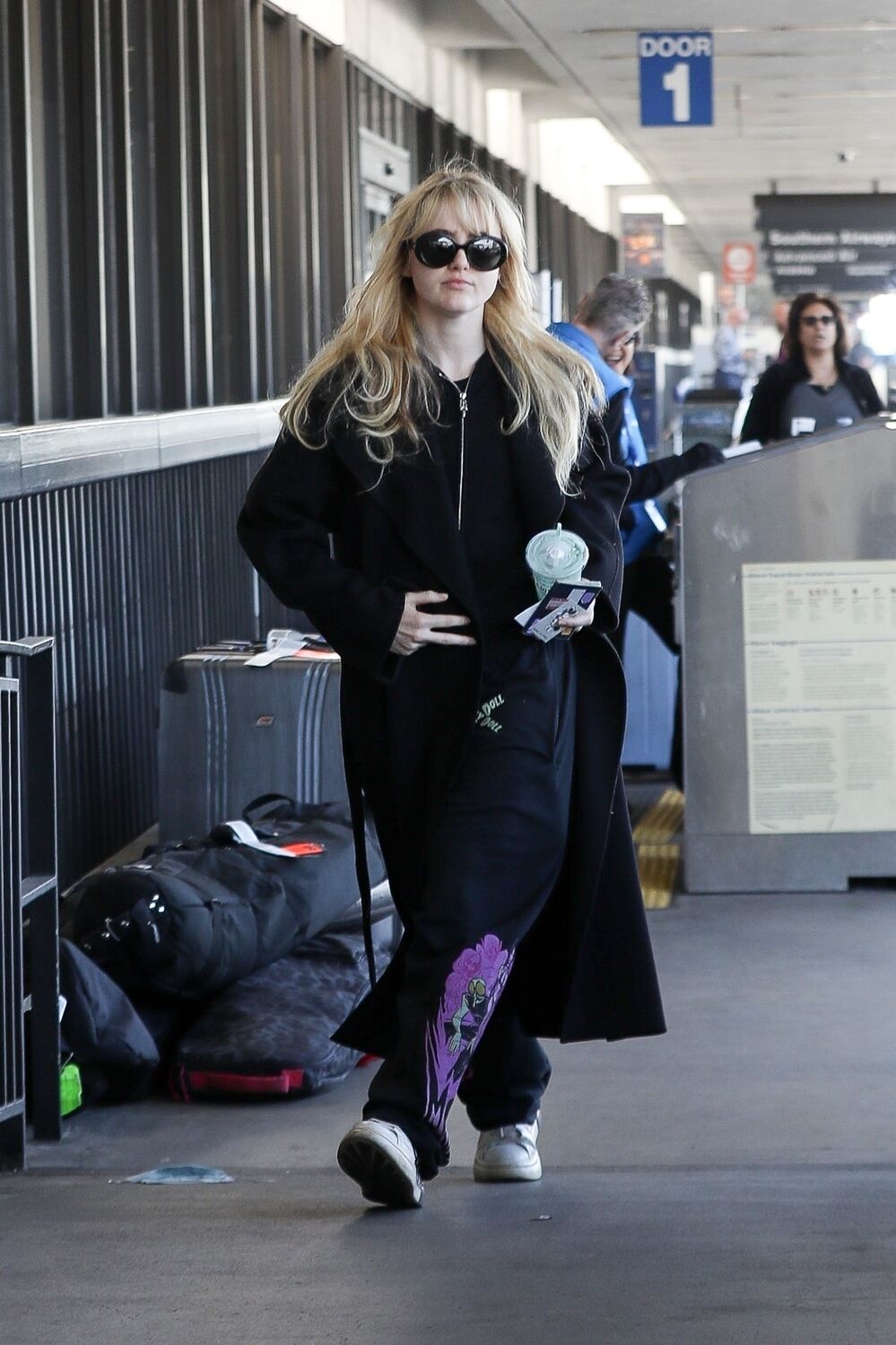 April 3 - At the LAX airport in Los Angeles - lax030423-010 - Kathryn